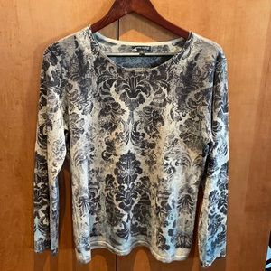 Woman’s cashmere sweater.  Ultra lite weight.  Beautiful pattern.